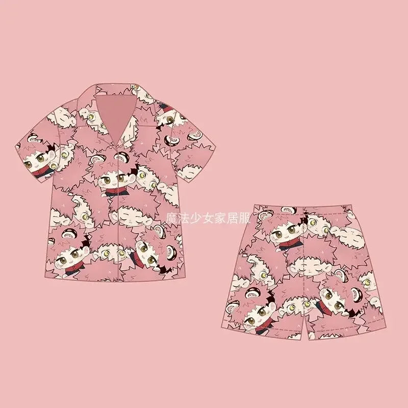 Pink pajama set with short-sleeve shirt and matching shorts, allover cartoon character print