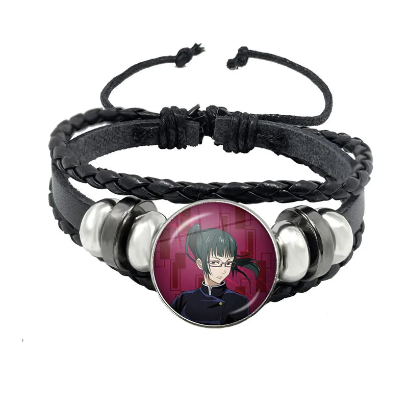 Bracelet tressé noir avec pendentif rond au personnage aux cheveux bleu-vert et anneaux argentés