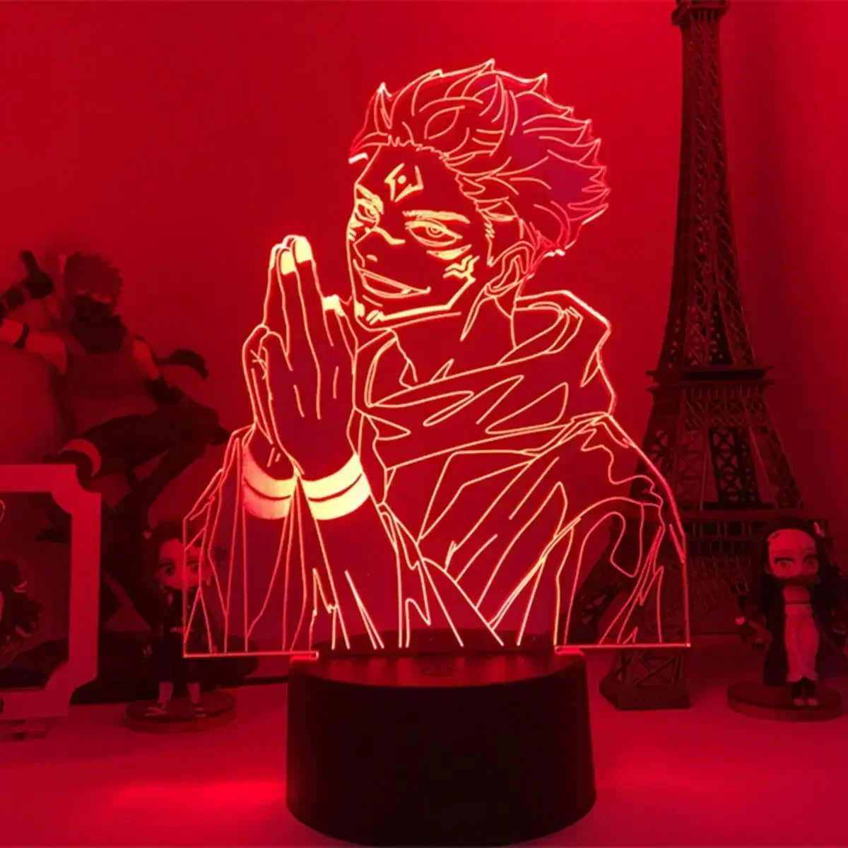 Lampe LED Sukuna Roi des Fléaux avec socle noir et illustration lumineuse rouge.