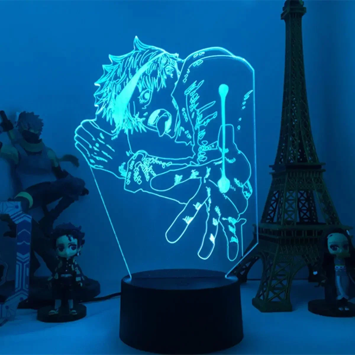 Lampe LED à motifs Inumaki, socle rond noir, panneau lumineux bleu