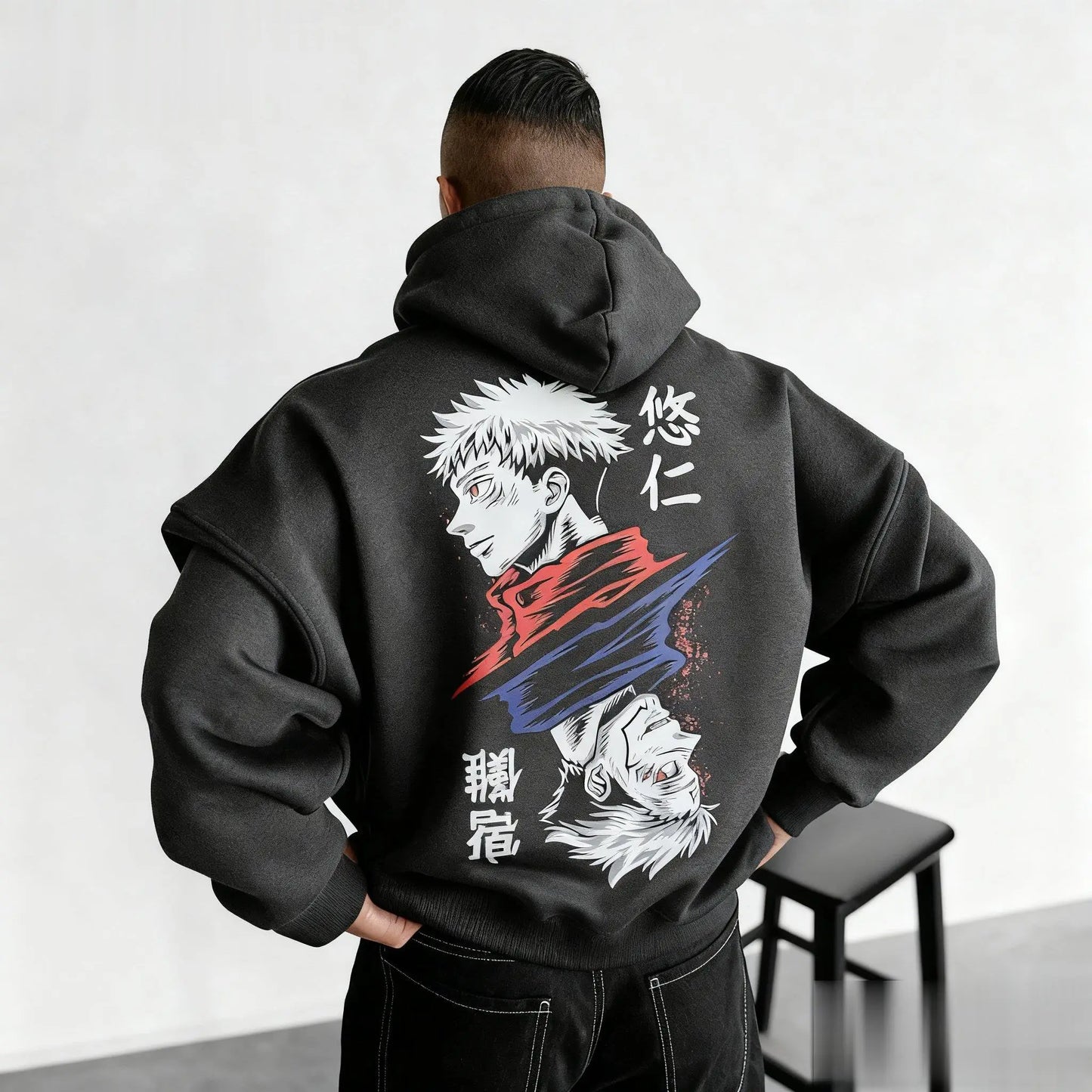 Charcoal hoodie back print featuring Sukuna face and red/blue flame graphic with text