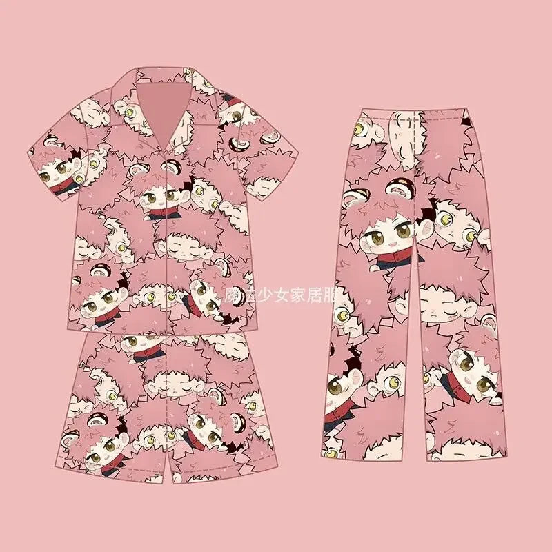 Pink pajama set with long-sleeve button shirt and matching long pants, character face pattern