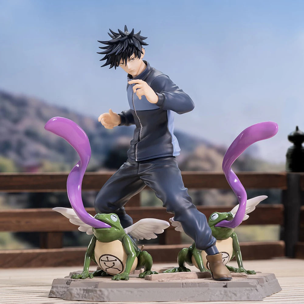 Figurine de personnage en tenue bleue, deux crapauds verts et tentacules violettes