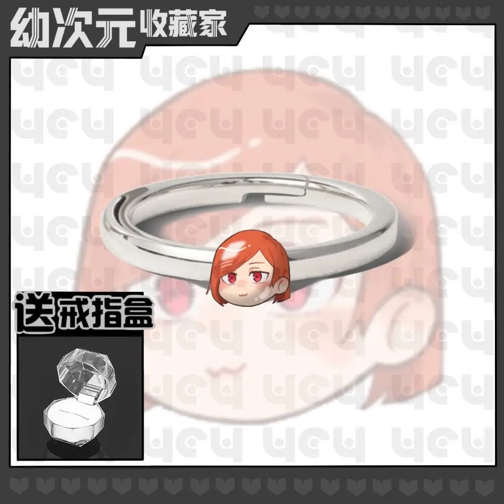Bague en métal argenté avec tête chibi cheveux rouges et yeux rouges
