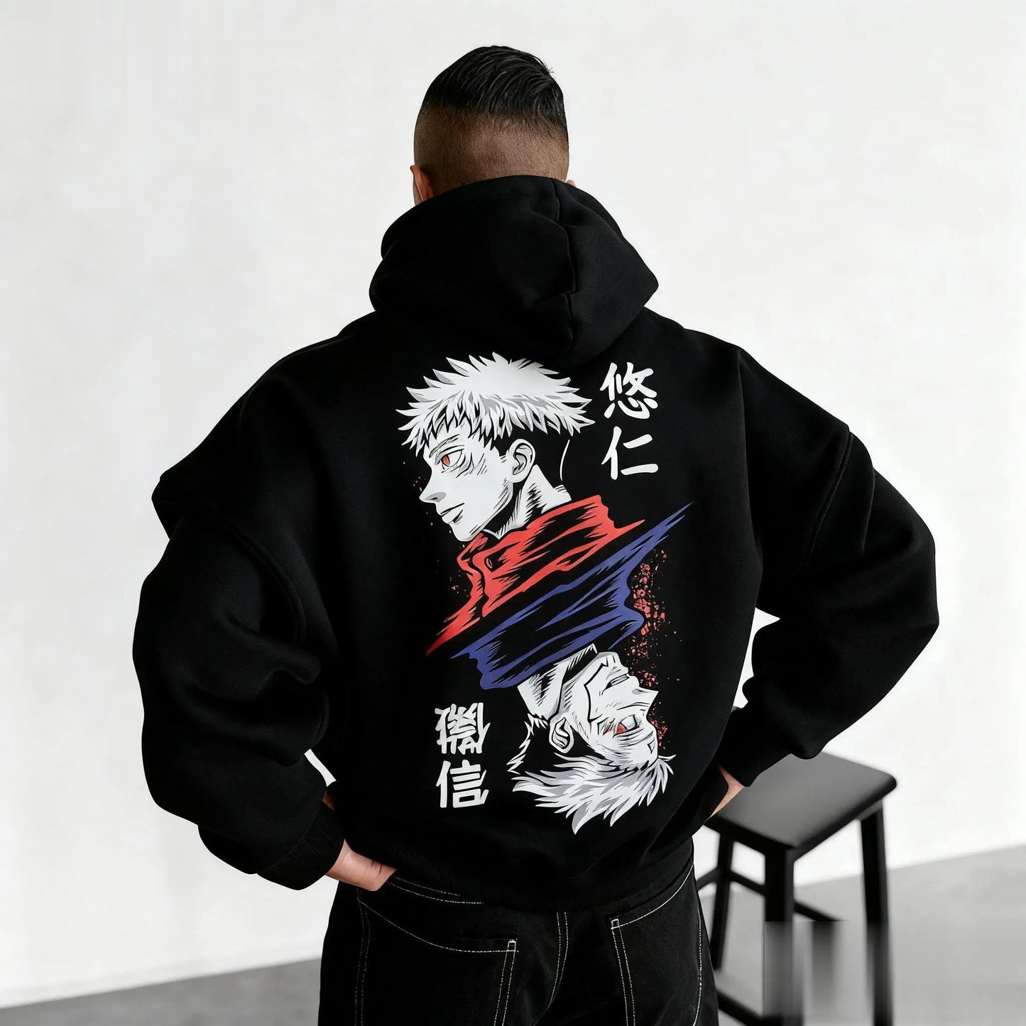 Dark hoodie back print with Sukuna character and stylized red/blue flame graphics