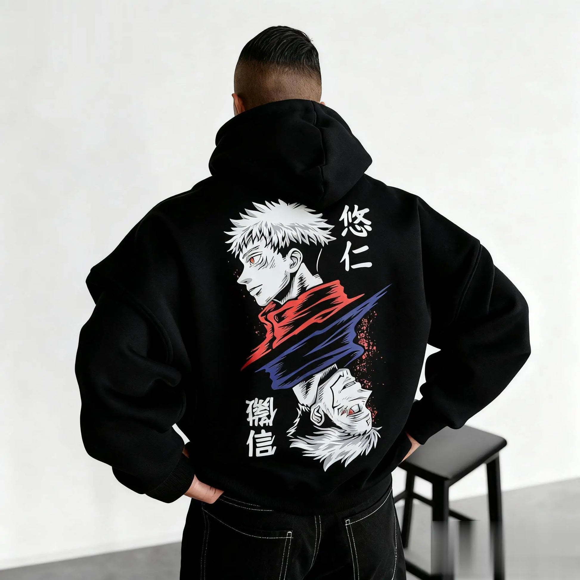 Dark hoodie back print with Sukuna character and stylized red/blue flame graphics